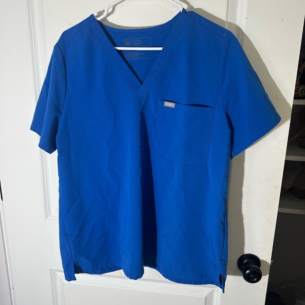 Figs women’s royal blue scrub top with front chest pocket